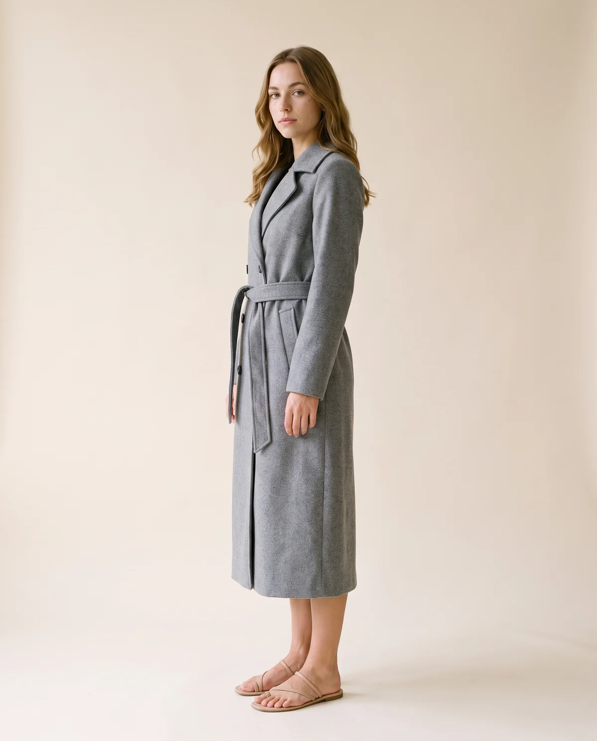 Long Belted Double-Breasted Trench in Grey, side view, worn by Ava