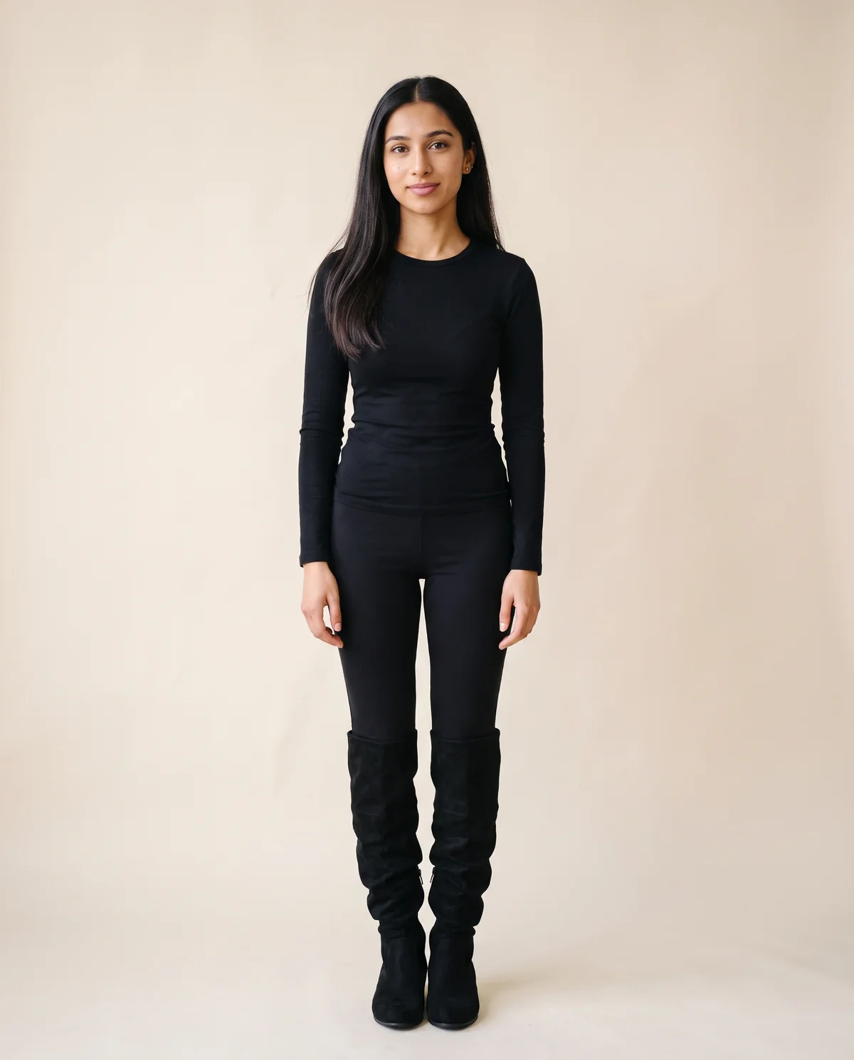 Faux Suede Slouch Boot in Black, front view, worn by Priya
