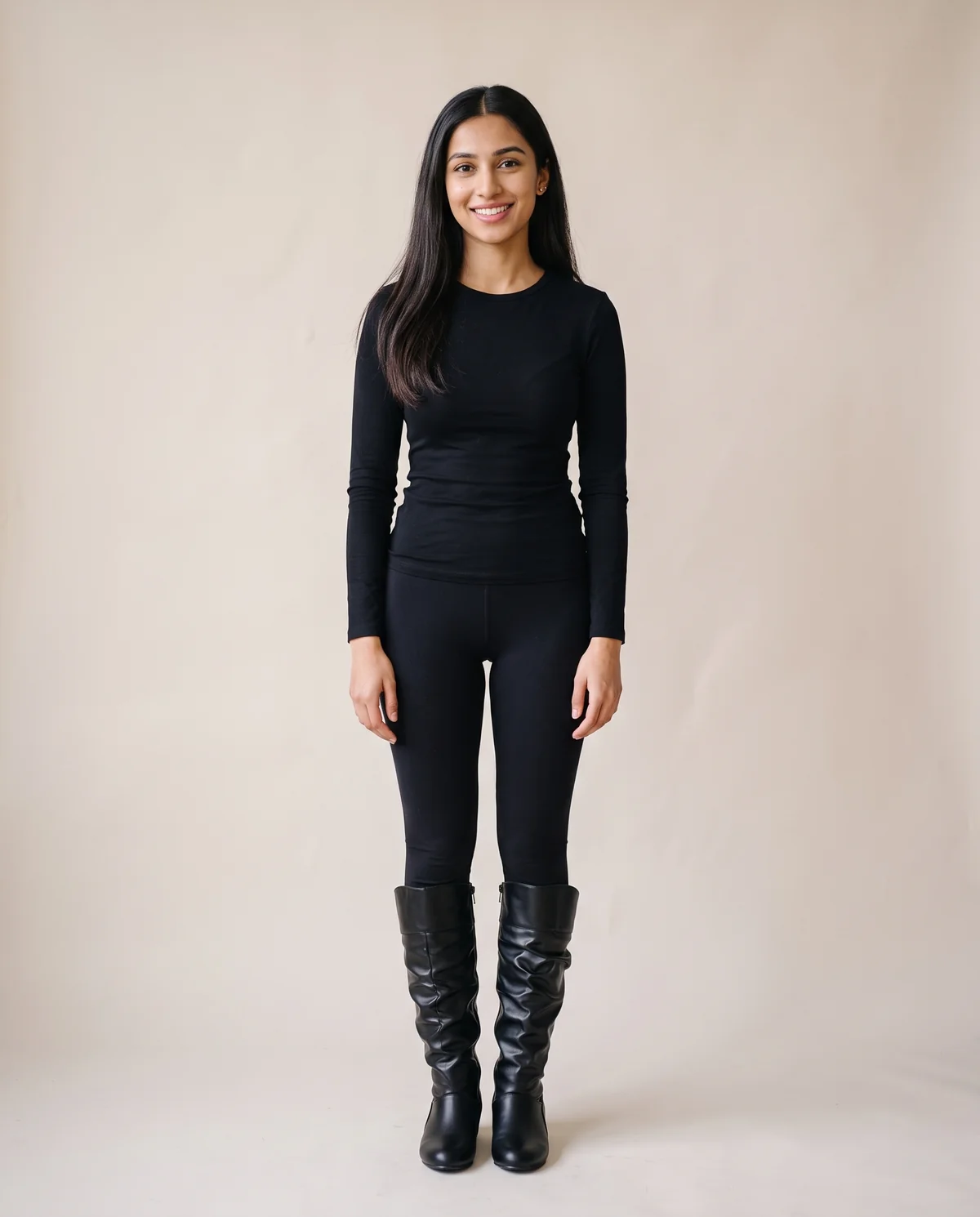 Ruched Slouch Knee-High Boot in Black, front view, worn by Priya