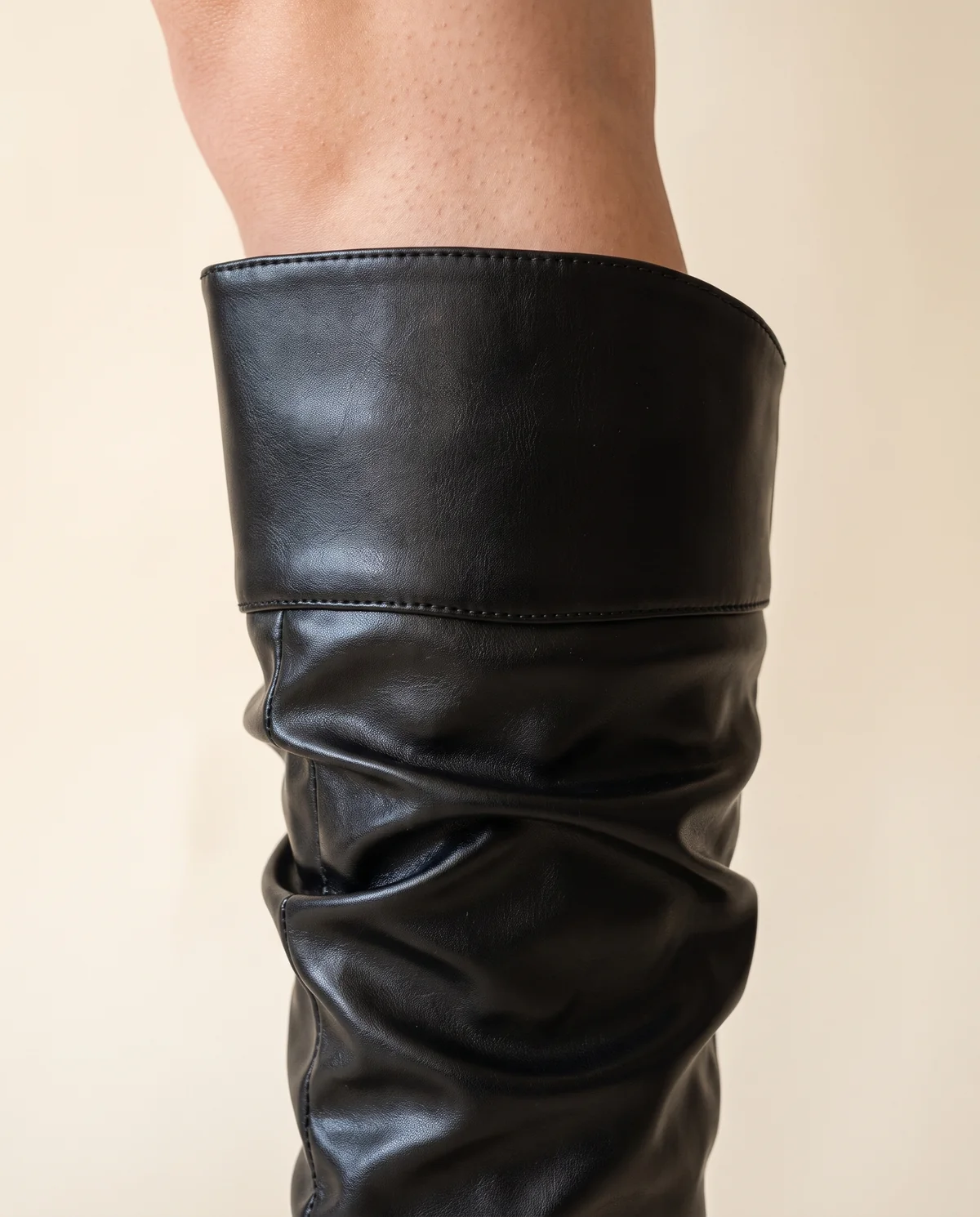 Ruched Slouch Knee-High Boot in Black, close-up of the detail