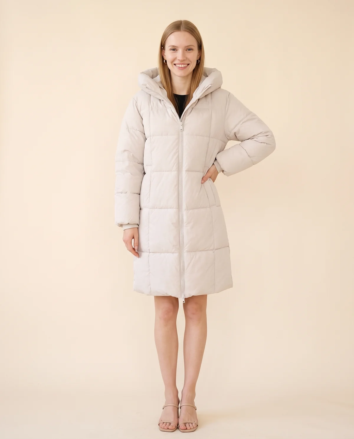 Straight Hooded Puffer Coat in Stone, front view, worn by Maya