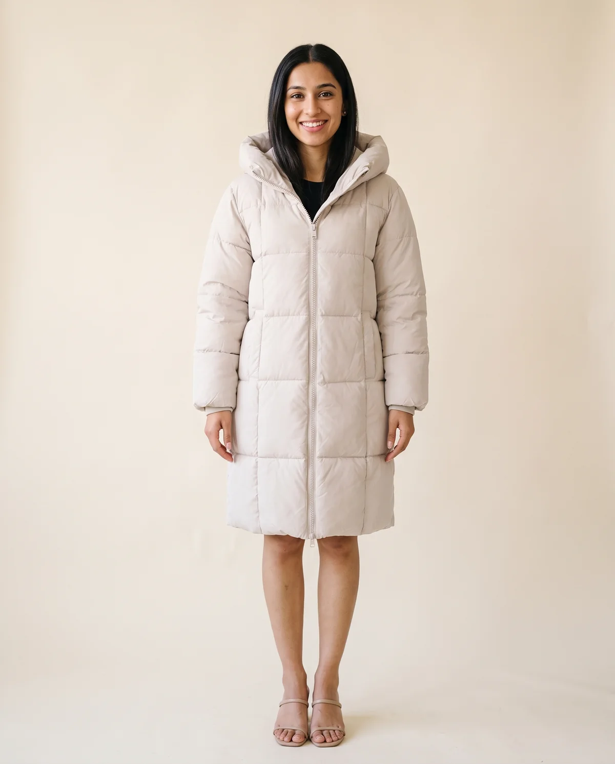 Straight Hooded Puffer Coat in Stone, front view, worn by Priya