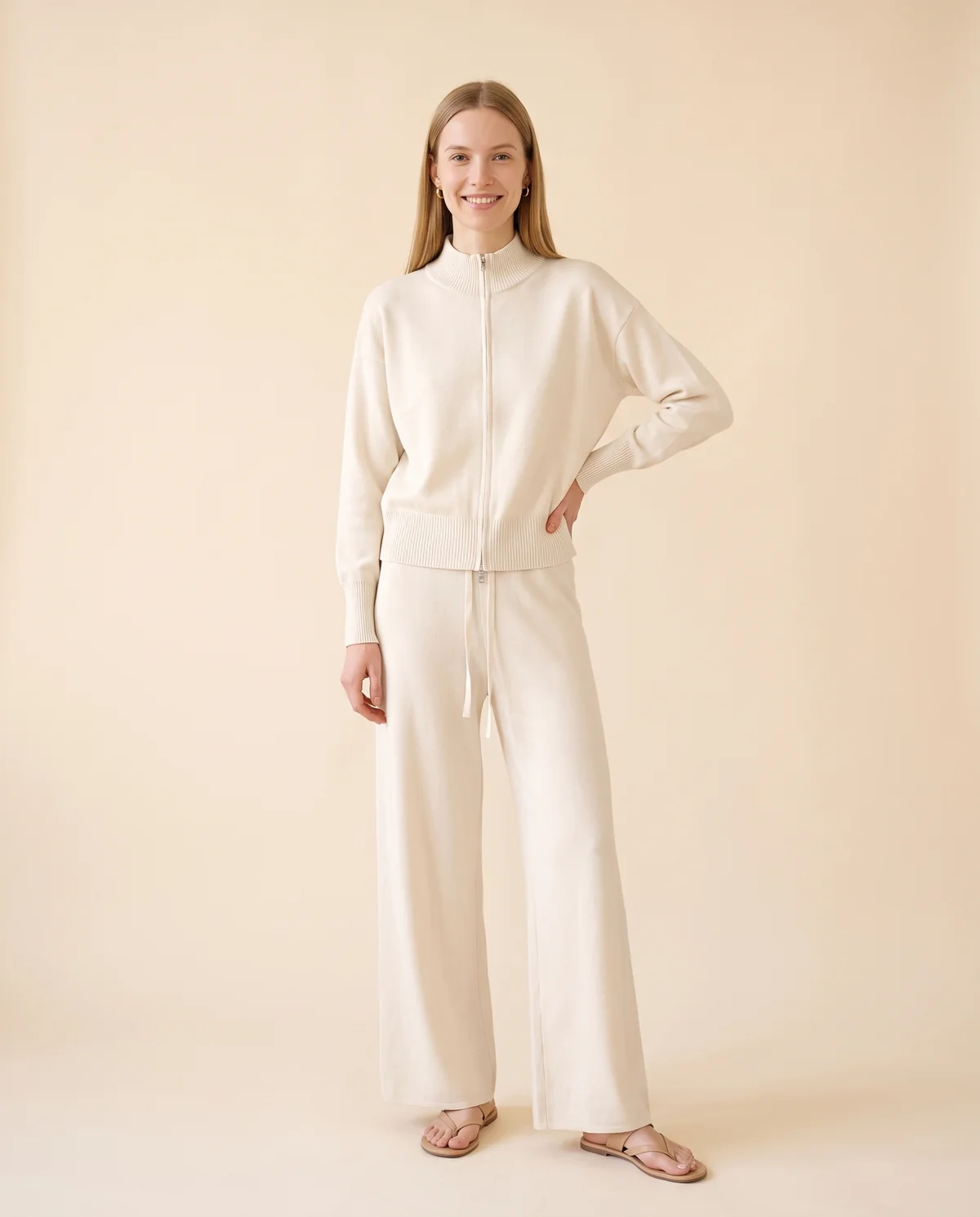 Cream Zip Cardigan and Wide-Leg Knit Trouser Set in Cream, front view, worn by Maya