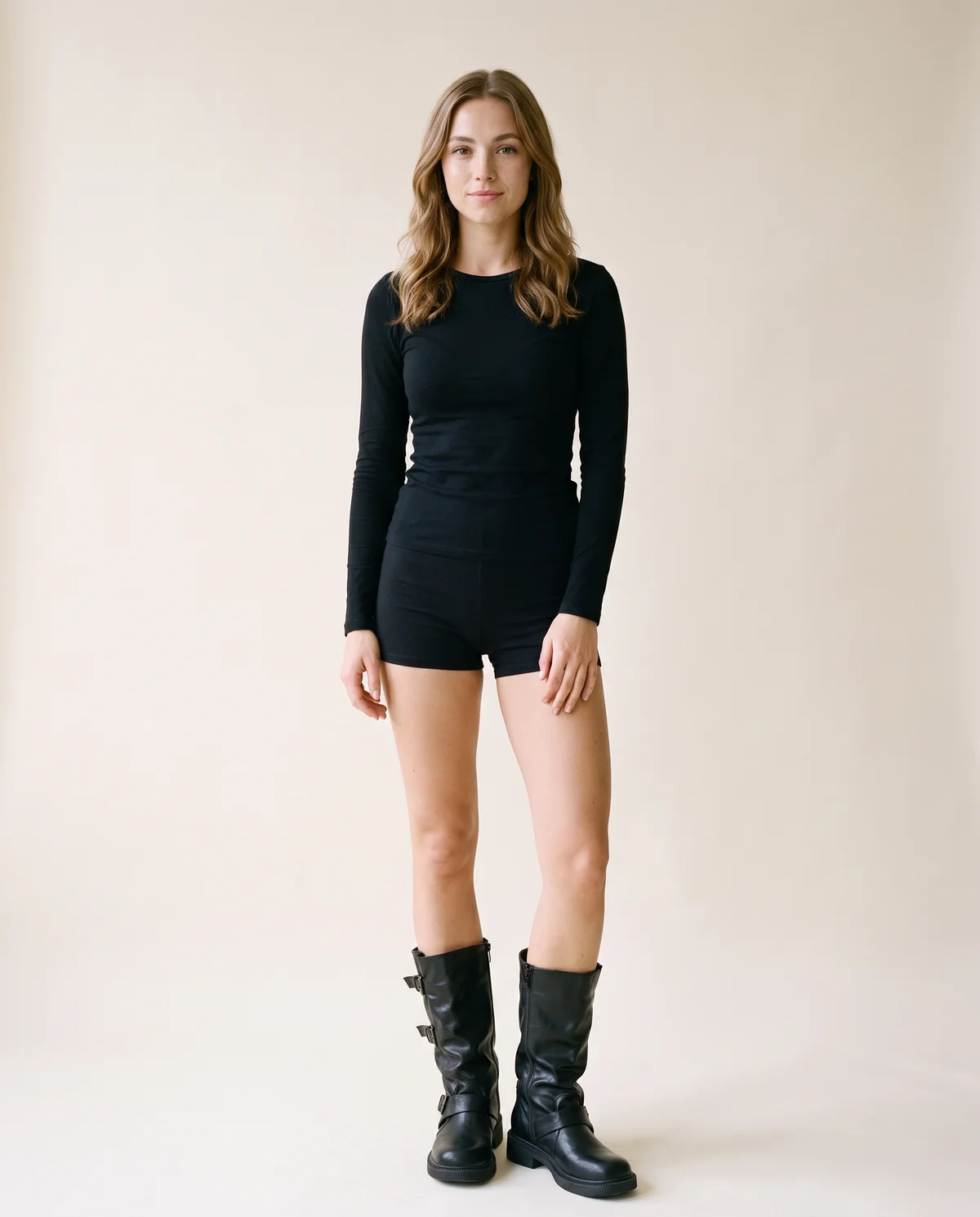 Triple-Buckle Slouch Mid-Calf Boot in Black, front view, worn by Ava