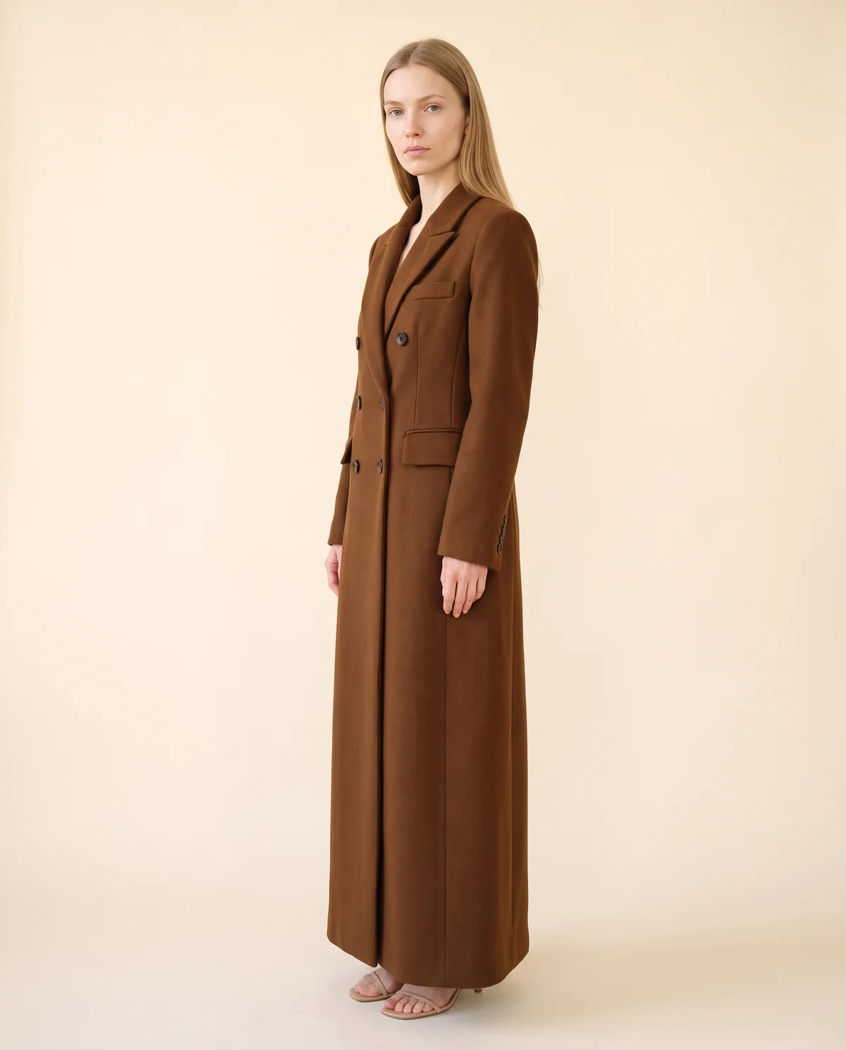 Double-Breasted Maxi Wool-Look Coat with Flap Pockets in Brown, side view, worn by Maya