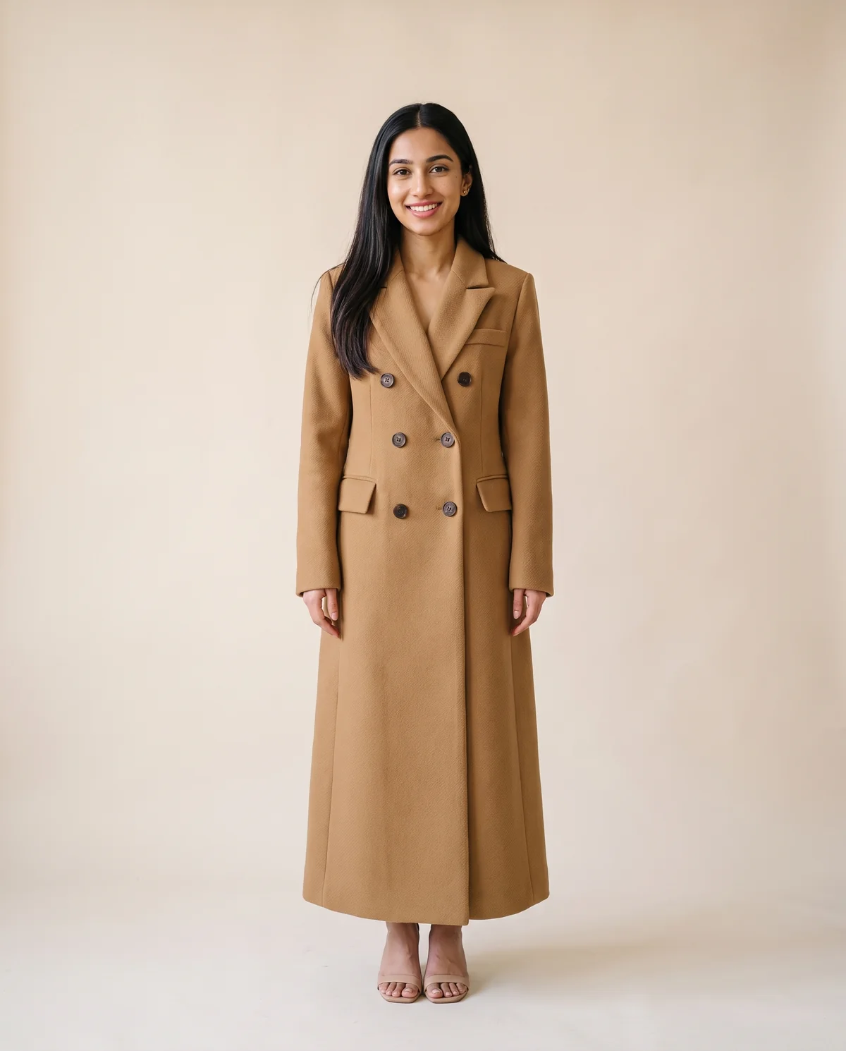 Double-Breasted Maxi Wool-Look Coat with Flap Pockets in Camel, front view, worn by Priya
