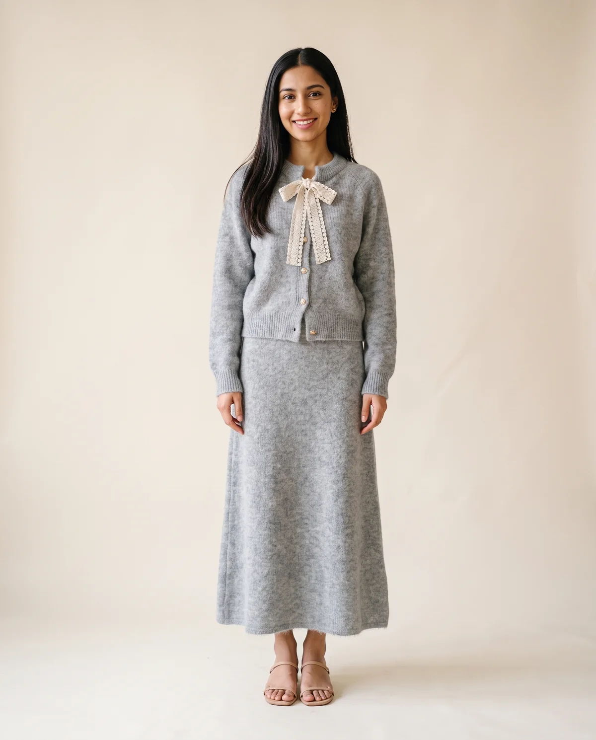 Bow Tie Cardigan and Knit Midi Skirt Set in Light Grey, front view, worn by Priya