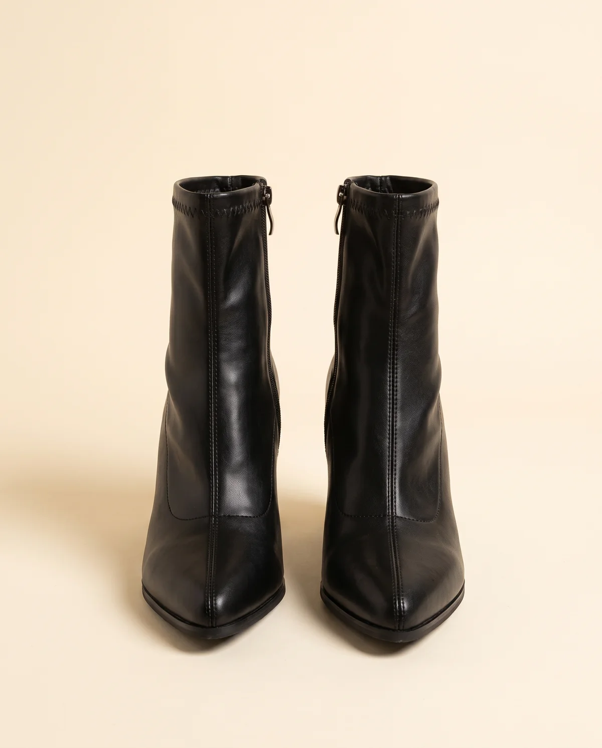 Stretch Pointed Block-Heel Ankle Boot in Black, product shot on a plain background