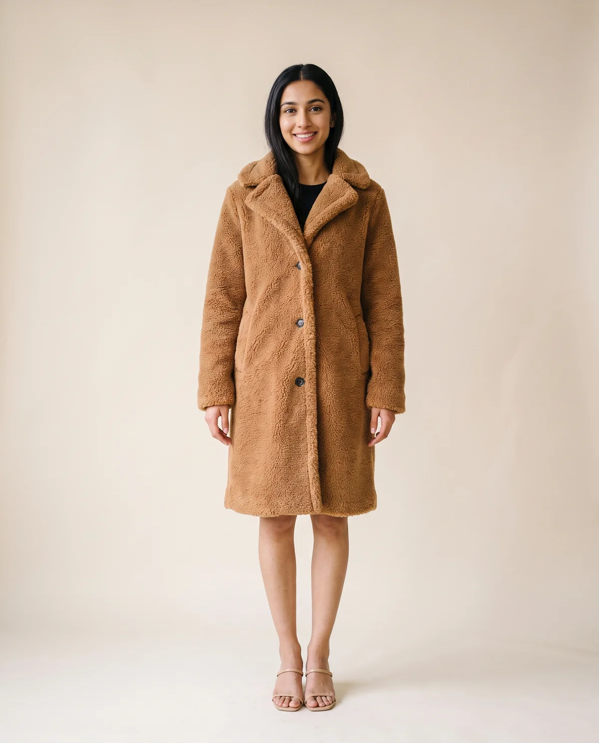 Button-Through Teddy Coat in Camel, front view, worn by Priya