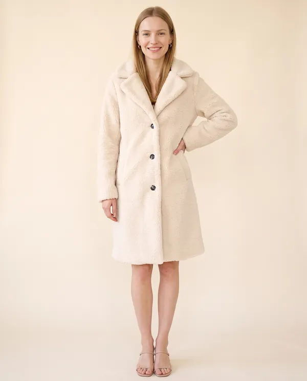 Button-Through Teddy Coat in Cream, front view, worn by Maya