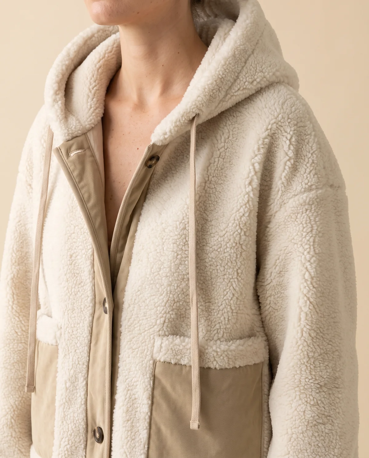 Hooded Faux Shearling Long Coat in Off-White, close-up of the detail