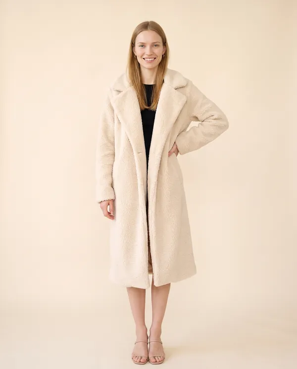 Open-Front Long Teddy Coat in Cream, front view, worn by Maya