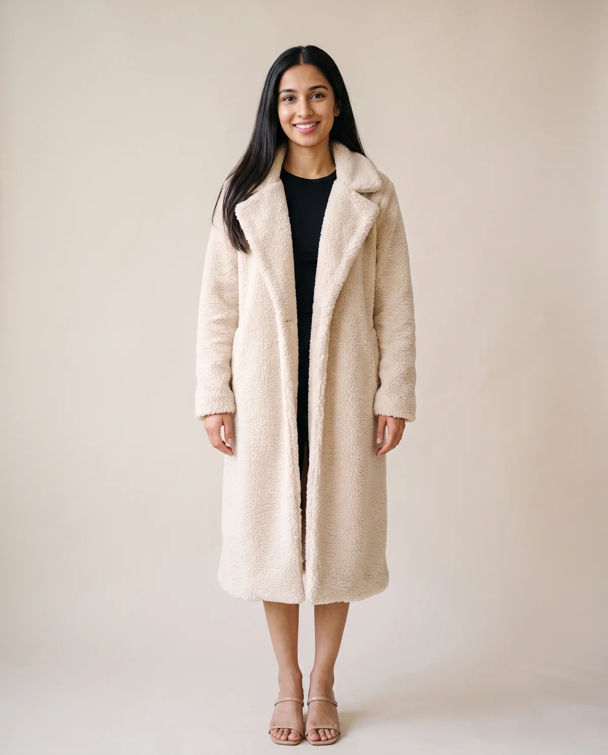 Open-Front Long Teddy Coat in Cream, front view, worn by Priya