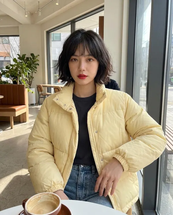 Satin Eve styling: Short Stand-Collar Puffer with Snap Front